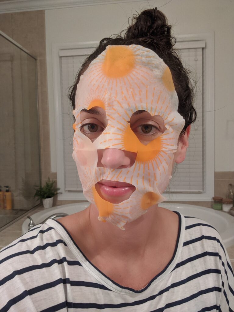 Woman doing a face mask. 