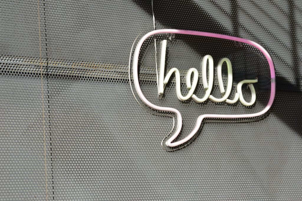 Image of a conversation bubble with the word hello